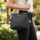 Černá plátěná crossbody kabelka Michael Kors