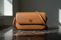 Hnědá kožená crossbody kabelka Michael Kors