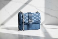 Modrá plátěná crossbody kabelka Michael Kors